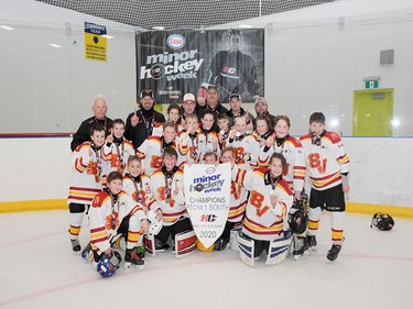 Calgary Herald, Jan. 19, 2020 Bow Valley 1 White prevailed in the Esso Minor Hockey Week Atom 1 South Division in Calgary on Jan. 18, 2020. coryhardingphotography.com