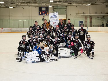 Calgary Herald, Jan. 19, 2020 The Crowfoot 5 Coyotes were howling after grabbing the Atom 6 North Division crown at Esso Minor Hockey Week in Calgary on Jan. 18, 2020. coryhardingphotography.com