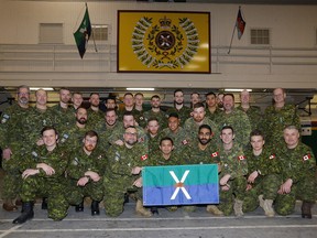 A group photo during a send off as the 41 Canadian Brigade Group (41 CBG)’s event marking the departure of 25 soldiers from the Calgary Highlanders deploying to Latvia for Operation REASSURANCE at Mewata Armoury in Calgary on Thursday, January 23, 2020. Darren Makowichuk/Postmedia