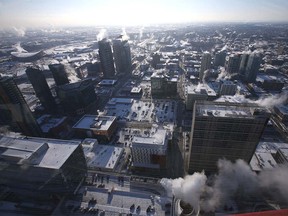 A frosty Calgary skyline is viewed from the observation deck of the Calgary Tower in downtown Calgary on Wednesday, January 15, 2020. All of Alberta, and most of western Canada, has been in a deep freeze, but temperatures are expected to rise starting later this week. Jim Wells/Postmedia