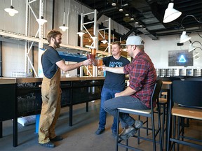 L-R: Alex Horner, Matthew Berard and Colin McLean – all co-founders of Calgary’s Banded Peak Brewing Ltd. are shown in Calgary in a recent undated photo. Courtesy Banded Peak Brewing