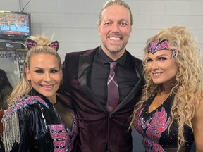 Nattie and Beth Phoenix with Edge at WrestleMania last year.