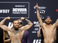 Welterweight fighters Conor McGregor, left, and Donald Cerrone pose during a ceremonial weigh-in for UFC 246 at Park Theater at Park MGM on Jan. 17, 2020 in Las Vegas, Nevada.  (Steve Marcus/Getty Images)
