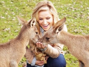 Nattie feeding her favourite animals, kangaroos, in Australia. (Supplied Photo)