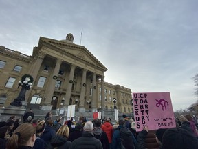 More than 200 people gathered to protest Bill 207, a private member's bill to legislate physician's conscience rights to refuse treatment or referrals to patients on moral or religious grounds, at the Alberta legislature building on Saturday, Nov. 7.