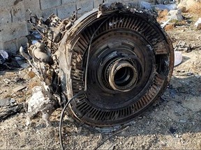 General view of the debris of the Ukraine International Airlines, flight PS752, Boeing 737-800 plane that crashed after take-off from Iran's Imam Khomeini airport, on the outskirts of Tehran, Iran January 8, 2020 is seen in this screen grab obtained from a social media video.