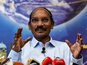 Chairman of the Indian Space Research Organisation (ISRO) Kailasavadivoo Sivan gestures as he announces ISRO's plans for 2020 including the progress in 'Chandrayaan 3' moon mission and 'Gaganyaan' mission for putting an Indian astronaut into space, during a press conference held at the ISRO headquarters in Bangalore on Ja. 1, 2020.