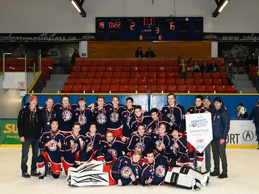 Calgary Herald, Jan. 19, 2020 Pushing through for the Esso Minor Hockey Week Midget 2 title in Calgary on Jan. 18, 2020, were the Northwest Warriors 2. coryhardingphotography.com