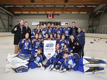 The CRAA Royals White show off their medals after winning 5-3 in the Bantam AA final during the Esso Minor Hockey Week tournament, on January 18, 2020, in Calgary. (Christina Ryan/Calgary Herald)