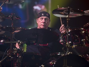 Drummer Neil Peart performs during a Rush concert at the Scotiabank Saddledome in Calgary, Alta., on Wednesday, July 15, 2015. ( Lyle Aspinall/Calgary Sun)