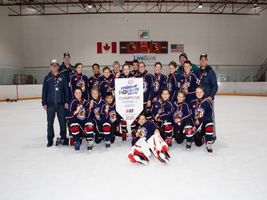 Calgary Herald, Jan. 19, 2020 Grabbing the crown in the Pee Wee 3 North Division during Esso Minor Hockey Week action on Jan. 18, 2020, were the North West Warriors 3 Red. coryhardingphotography.com