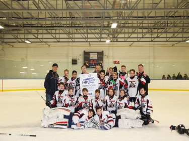 Calgary Herald, Jan. 19, 2020 The Trails West 5 White Wolves skated to the Esso Minor Hockey Week Pee Wee 5 South Division title on Jan. 18, 2020, in Calgary. coryhardingphotography.com