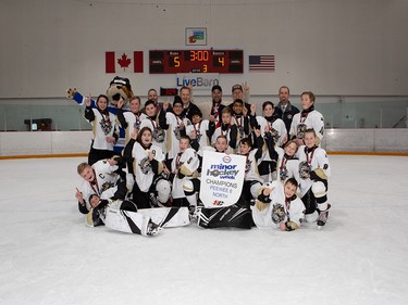 Calgary Herald, Jan. 19, 2020 Crowfoot 5 Coyotes took top spot in the Pee Wee 6 North Division during Esso Minor Hockey Week action in Calgary on Jan. 18, 2020. coryhardingphotography.com