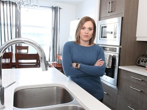 Sarah Bieber poses for a photo in her SW home. Bieber is the spokeswoman for Kids Come First, a parent group whom is frustrated with the vague report cards given by the CBE to students in elementary and junior high school. Friday, January 17, 2020. Brendan Miller/Postmedia