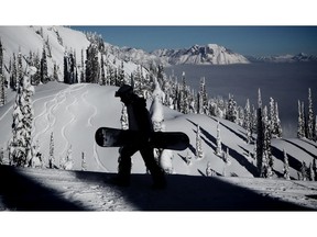 A snowboarder makes his way up Timber Bowl at Fernie Alpine Resort. Al Charest / Postmedia ORG XMIT: POS1801171321460439
