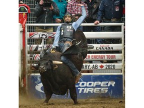 Garrett Green (Meeting Creek, Alta.) paired up with TNT (Vold Rodeo) in the second round of the PBR Canada's Monster Energy Tour event at Calgary's Nutrien Western Event Centre at Stampede Park on Saturday. Photo by Sean Libin/Special for Postmedia.