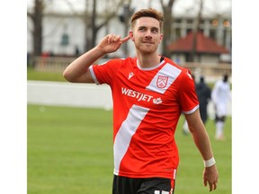 Cavalry FC Joel Waterman gestures to Calgary fans as they celebrate a victory following CPL soccer action between FC Edmonton and Cavalry FC in Calgary at Atco Field at Spruce Meadows on May 18, 2019. File photo by Jim Wells/Postmedia.