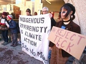 Protesters against approval of Teck's Frontier oilsands mine gather on 9th Avenue S.E. in Calgary on Wednesday, Jan. 22, 2020. The protest was countered by a pro-oilsands group.