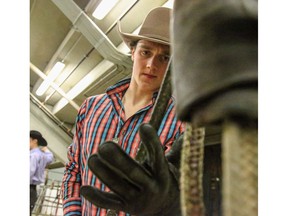 Calgary bullrider Nick Tetz prepares his bull rope and gets ready to take on the 2020 season of the PBR CanadaÕs Monster Energy Tour event at Calgary's Nutrien Western Event Centre at Stampede Park on Friday January 24, 2020. Photo by Sean Libin/ Special for Postmedia