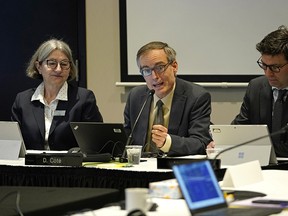 Kathy Penney, left, Damien Cote and Mark Watton of the Canada Energy Regulator at a route hearing in Spruce Grove on Tuesday, Jan. 28, 2020. The purpose of detailed route hearings is to allow the commission to determine the exact placement of the pipeline on the lands that it crosses, as well as the most appropriate methods and timing of construction.