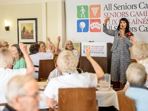 Leela Aheer, minister of culture, multiculturalism, and status of women performs a song at the opening ceremony  of the 2020 Senior Games at Auburn Heights Retirement Residence on Monday, February 3, 2020. Azin Ghaffari/Postmedia