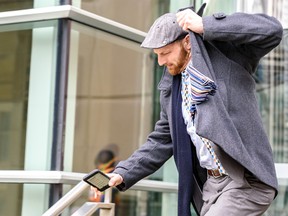 Tom Bain leaves the courthouse on Thursday, February 13, 2020. Azin Ghaffari/Postmedia