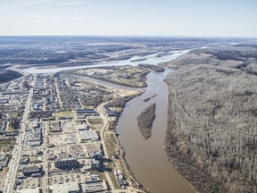 An aerial view of downtown Fort McMurray Alta. next to the Athabasca and Clearwater River on Thursday May 4, 2017. Robert Murray/Fort McMurray Today/Postmedia Network ORG XMIT: POS1705091801221924 ORG XMIT: POS1905271603341397