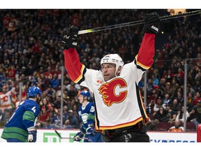 VANCOUVER, BC - FEBRUARY 08: Milan Lucic #17 of the Calgary Flames celebrates after scoring a goal against the Vancouver Canucks during NHL action at Rogers Arena on February 8, 2020 in Vancouver, Canada.