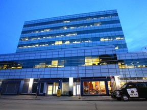 Calgary Police park in front the Safe Consumption Site at the Sheldon Chumir Health Centre in downtown Calgary on Friday, January 31, 2020.  Jim Wells/Postmedia