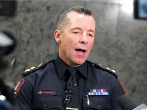 Calgary Police Chief Mark Neufeld speaks to reporters following a Calgary Police Commission public meeting on Tuesday, February 25, 2020.