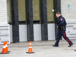 Police investigate a shooting in the parking lot of the Circle K on 11ave. and 1str. S.W. in downtown Calgary on Saturday, February 29, 2020. Darren Makowichuk/Postmedia