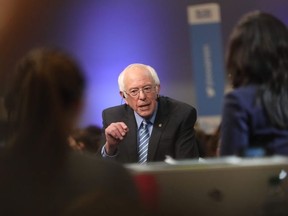 Democratic presidential hopeful Vermont Senator Bernie Sanders gives an interview in the spin room after participating in the tenth Democratic primary debate of the 2020 presidential campaign season co-hosted by CBS News and the Congressional Black Caucus Institute at the Gaillard Center in Charleston, South Carolina, on February 25, 2020.