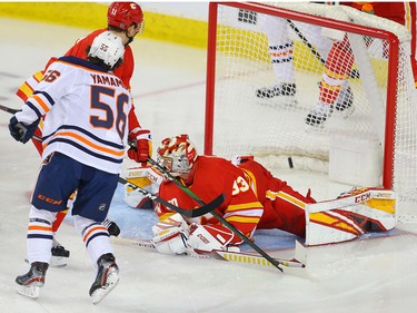 Edmonton Oilers Kailer Yamamoto with a goal against goalie David Rittich of the Calgary Flames during NHL hockey in Calgary on Saturday February 1, 2020.