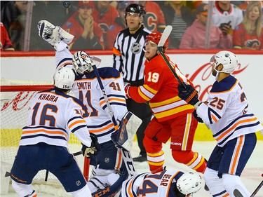 Edmonton Oilers goalie Mike Smith with a save on Matthew Tkachuk of the Calgary Flames during NHL hockey in Calgary on Saturday February 1, 2020.