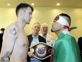 Calgary's Devin Reti and Mexico's Victor Rangel pose for a photo during weighs-in at the Deerfoot Inn & Casio prior to the Dekada card boxing competition. Friday, February 14, 2020. Brendan Miller/Postmedia