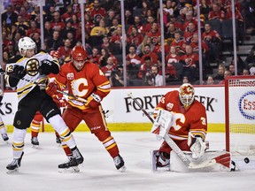 Calgary Flames David Rittich makes a save against Boston Bruins during the second period in Scotiabank Saddledome on Friday, February 21, 2020.