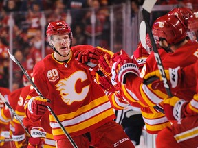 Calgary Flames forward Buddy Robinson celebrates his goal against the Edmonton Oilers at Scotiabank Saddledome on Feb. 1, 2020.