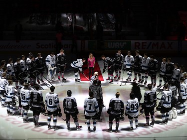 The Calgary Hitmen and the Winnipeg Ice gather at centre ice for a ceremonial puck drop before the TELUS Be Brave #endbullying game on Thursday, February 27, 2020.  Gavin Young/Postmedia