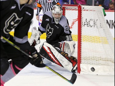 Calgary Hitmen goaltender Brayden Peters stops this Winnipeg Ice shot during the TELUS Be Brave #endbullying game on Thursday, February 27, 2020. The Hitmen won the game 4-1. Gavin Young/Postmedia