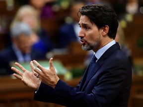 Canada's Prime Minister Justin Trudeau gestures as he speaks in parliament during Question Period in Ottawa, Ontario, Canada February 18, 2020.  REUTERS/Patrick Doyle ORG XMIT: GGG-OTW126