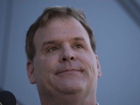 Former Conservative MP John Baird speaks to the media in Markham, Ont., on Sunday, Oct. 11, 2015.