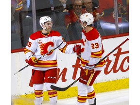 Calgary Flames, Andrew Mangiapane battles Anaheim Ducks, Ryan Getzlaf before his empty net goal for the hat-trick in third period action at the Scotiabank Saddledome in Calgary on Monday, February 17, 2020. Darren Makowichuk/Postmedia