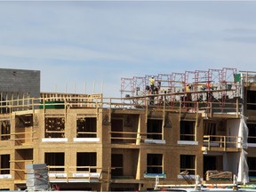 University District NW workers at new condo construction -