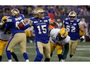 Winnipeg Blue Bombers quarterback Matt Nichols unloads the ball under pressure during CFL action against the Edmonton Eskimos in Winnipeg on Thurs., June 27, 2019. Kevin King/Winnipeg Sun/Postmedia Network