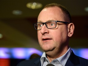 Calgary Flames General Manager Brad Treliving speaks with the media after the team's 40th season luncheon at Scotiabank Saddledome on Monday, March 9, 2020. Azin Ghaffari/Postmedia