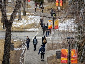 People move through the University of Calgary campus on Wednesday, March 11, 2020.