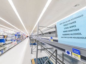 Toilet paper shelves have been emptied by shoppers at the Westbrook Mall Walmart on Friday, March 13, 2020.
