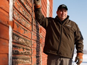 John Guelly is seen on his family farm close to Pickardville, Alberta on Sunday, Feb. 10, 2019.