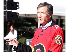 Jeff McCaig, Chairman of the Calgary Flames Foundation speaks before a street hockey game with current and past grade six students to celebrate the Flames YMCA Grade 6 program in front of Eau Claire Market on Friday, October 11, 2019. Brendan Miller/Postmedia