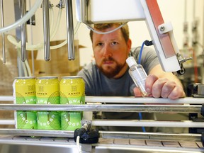 Annex Ale Project Founder, Andrew Bullied is going turn their beer into hand sanitizer as the city is in need of it to fight the COVID-19 in Calgary on Wednesday, March 18, 2020. Darren Makowichuk/Postmedia